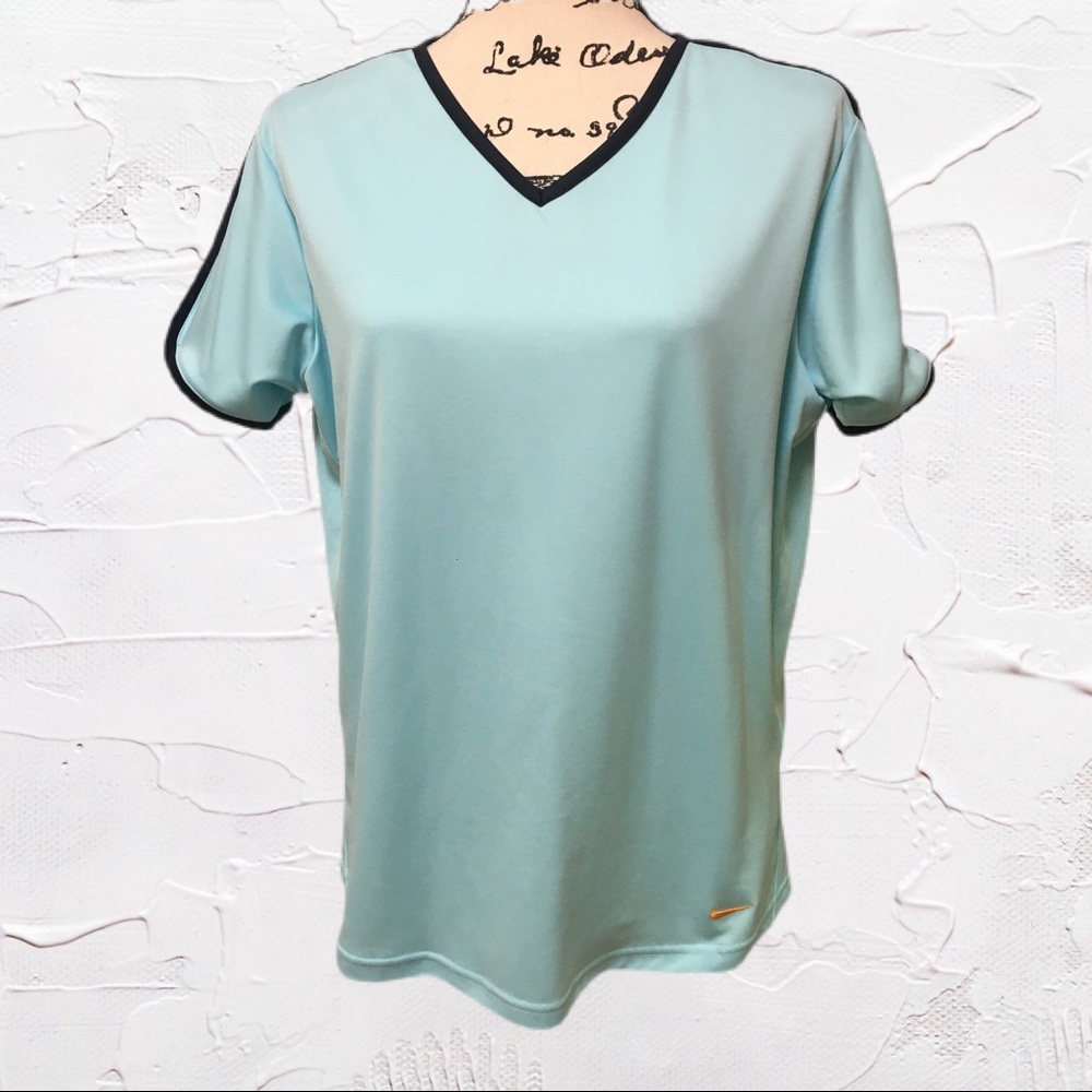 Nike women’s light turquoise athletic top